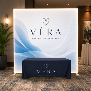 EliteGlow Display Package, 8' wide Lightbox Wall and 6' premium drape style tablecloth closed back grouped